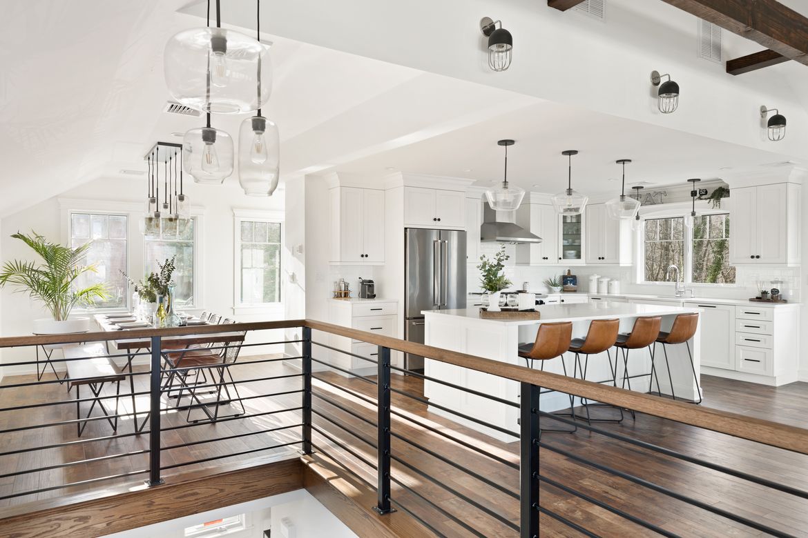 Beautiful-Wood-and-Steel-Railings-in-Open-Concept-Kitchen-and-Living-Area-NDA-Kitchens